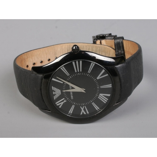 486 - A men's Emporio Armani quartz wristwatch on leather strap.