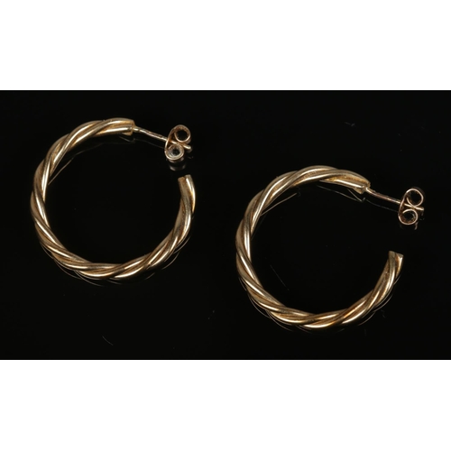 494 - A pair of 9ct gold twisted hoop earrings. Total weight 4g.