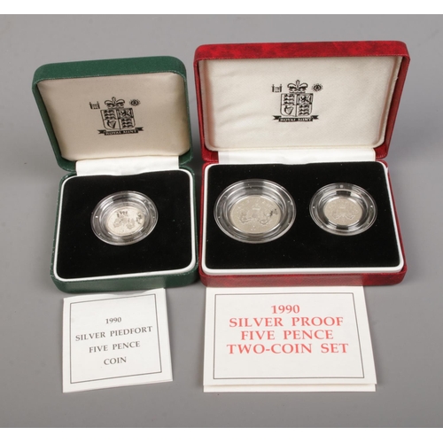 501 - Two cased Royal Mint 1990 silver proof five pence coin sets to include piedfort example.