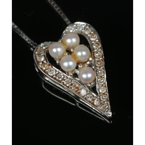 509 - A 9ct white gold Vicenza pendant on chain set with freshwater pearls surrounded by diamonds. Total w... 