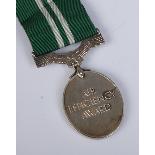 527 - A George VI Air Efficiency Medal awarded to 870018 LAC. Clarence Henry Hancock. R.AUX.A.F with coord... 