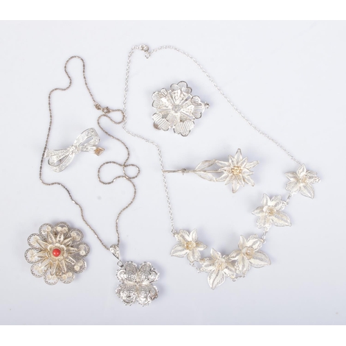 547 - A small collection of silver filigree jewellery to include two necklaces on silver chains and four b... 