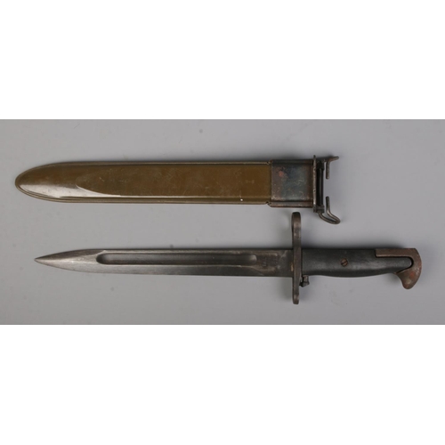 573 - A World War Two US army Garand M1 rifle bayonet. Dated 1943. Blade length 24.5cm.