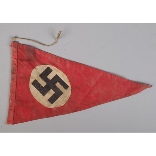 580 - A small Third Reich NSDAP pennant flag. Length 34.5cm.