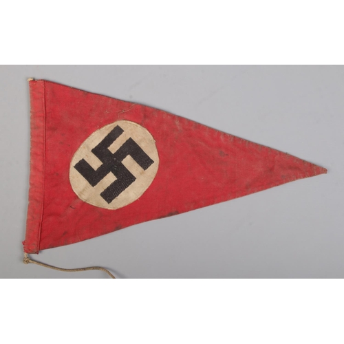 580 - A small Third Reich NSDAP pennant flag. Length 34.5cm.