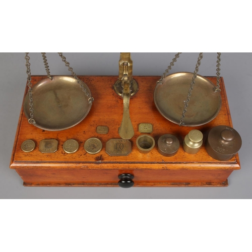 327 - A boxed set of Victorian brass bankers scales, by J. Hare, Birmingham, together with an assortment o... 