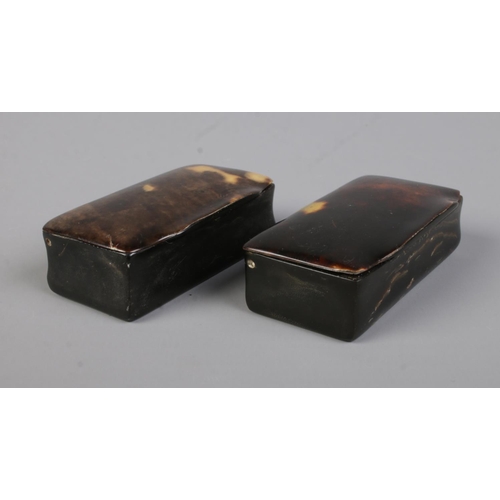 471 - Two tortoiseshell hinged pill boxes of similar size. 5.5cm long.