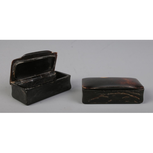 471 - Two tortoiseshell hinged pill boxes of similar size. 5.5cm long.