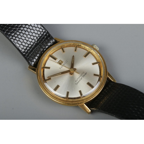 520 - A Gents yellow metal Tissot Automatic Seastar Seven wristwatch on black Apollo strap. In soft shell ... 