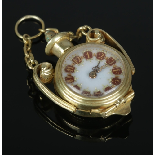 521 - A yellow metal fob watch, housing Buren Grand Prix 15 jewel movement. Set with a bloodstone to the b... 