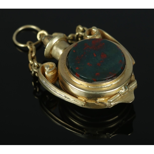 521 - A yellow metal fob watch, housing Buren Grand Prix 15 jewel movement. Set with a bloodstone to the b... 