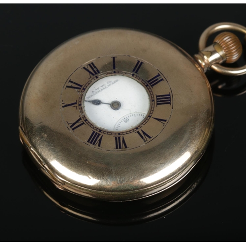 540 - A gold plated Waltham Mass half hunter pocket watch, with gold plated fob chain and T-fob. Fitted wi... 