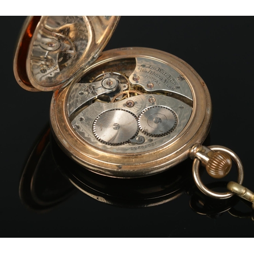 540 - A gold plated Waltham Mass half hunter pocket watch, with gold plated fob chain and T-fob. Fitted wi... 