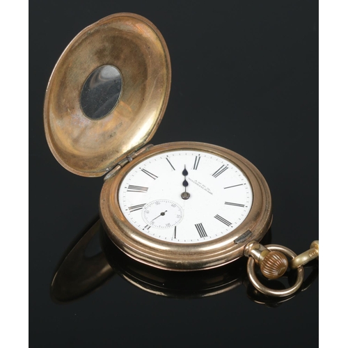 540 - A gold plated Waltham Mass half hunter pocket watch, with gold plated fob chain and T-fob. Fitted wi... 