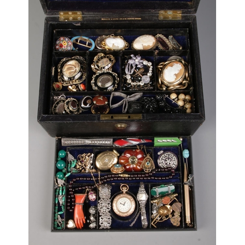 576 - A Parkins and Gotto (Oxford Street) multi-layer jewellery box containing an extremely large quantity... 