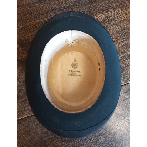 342 - A Woodrow & Sons black silk top hat with hat box. Front to back 19cm, side to side 15cm.