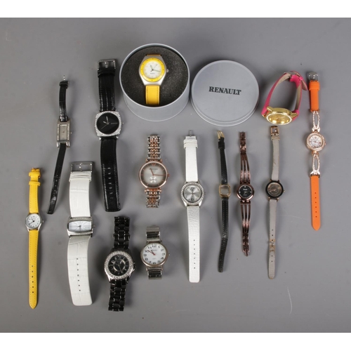 112 - A good collection of assorted wrist watches to include Renault, Citron, Emporio Armani, Oasis, Ravel... 