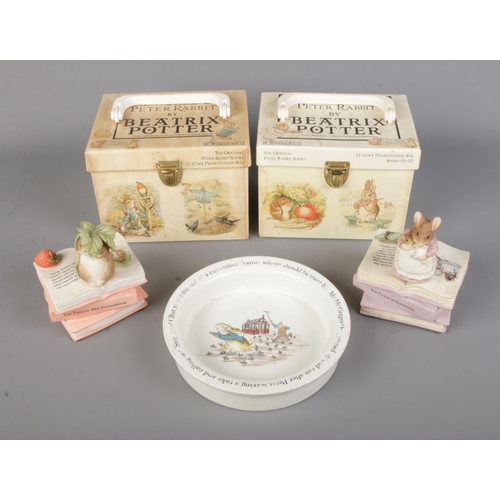 121 - A quantity of Beatrix Potter collectables to include two cased sets of The Friends of Peter Rabbit b... 