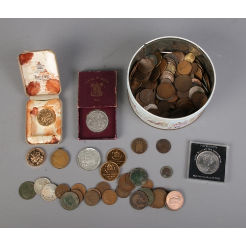 138 - A collection of assorted coins and commemorative medals to include two gold plated bronze Princes of... 