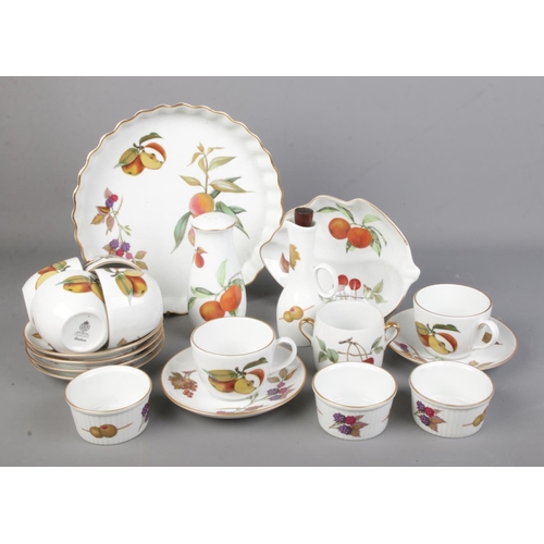 149 - A collection of Royal Worcester Evesham tea and dinner wares.