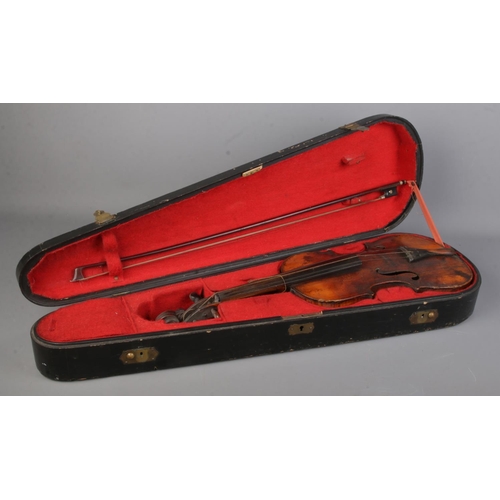 153 - An antique 14 inch violin in hard case. Having two piece back.