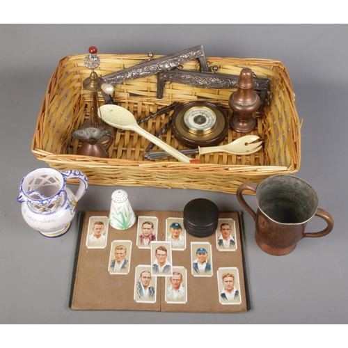 157 - A basket of collectables. Includes copper measures, Copeland sugar shaker, micro mosaic hat pin, Pla... 