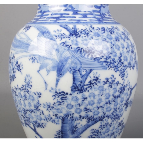 158 - A Chinese baluster vase decorated in underglaze blue. Height 21.5cm.