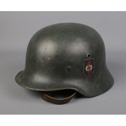 165 - A German World War Two M40 steel helmet.