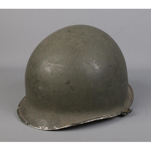 167 - An American M1 military helmet.