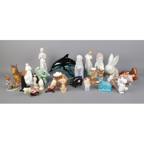 177 - A good collection of assorted ceramic figures to include Royal Doulton Loving You (HN3389), Poole Do... 