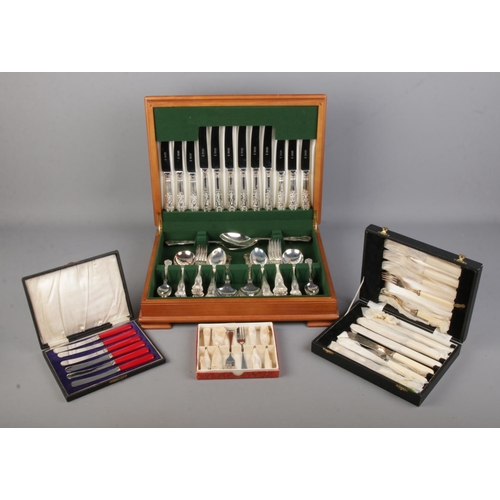 200 - An Osborne canteen of cutlery along with other cased/boxed cutlery.