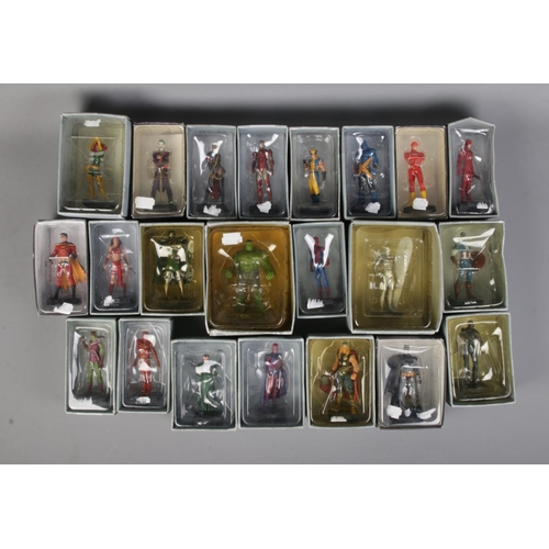 32 - A collection of Eaglemoss Marvel and DC figures to include Iron Man, The Joker, Batman, Robin, Thor,... 