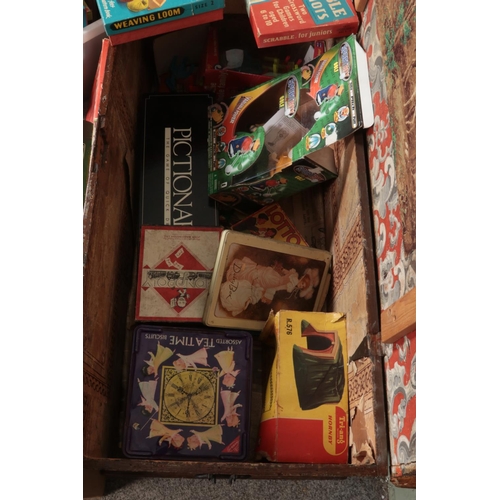 235 - A large collection of vintage games and toys including scrabble, monopoly, dad's army board game, Me... 