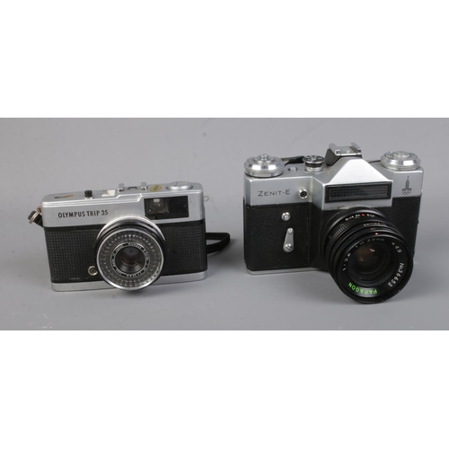 33 - Two vintage cameras to include Olympus Trip 35 and Zenit-E Moscow 1980 Olympic edition.