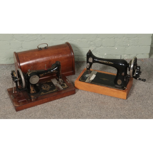 286 - Two vintage hand crank sewing machines to include Singer and dome topped wooden cased Vickers exampl... 