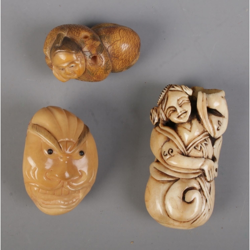 467 - A collection of Japanese Netsukes to include carved bone and two composite examples.