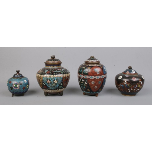 71 - Four Cloisonne ginger jars, all bearing stylised floral detailing, one bearing swooping bird. Talles... 