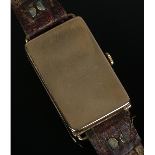 486 - A circa 1920's rolled gold wristwatch featuring oblong face and subsidiary dial.