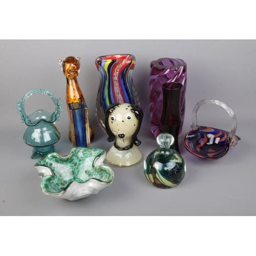 73 - A collection of assorted art glass to include Fifth Avenue Crystal cat, Mdina paperweight, heavy col... 