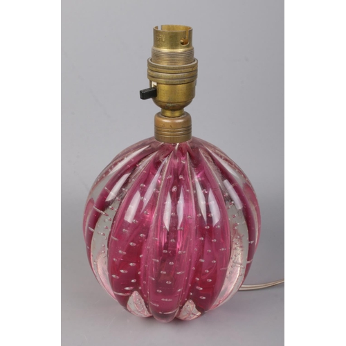 77 - A Murano pink Bullicante bubble glass lamp of globular form by Archimede Seguso.