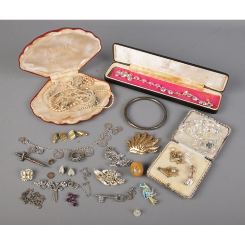 488 - A collection of mainly vintage jewellery. Includes 18ct gold front and back cufflinks, Celtic sword ... 