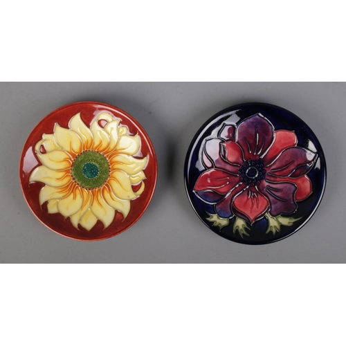 493 - Two Moorcroft pottery pin dishes in the Inca Sunflower (dated 1996) and Anemone patterns (dated 1998... 