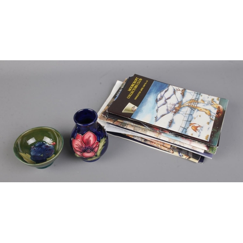 498 - Two pieces of Moorcroft pottery to include small vase in the Anemone pattern and footed bowl in the ... 