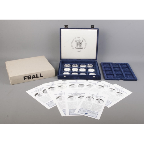 501 - A cased set of twelve silver proof European Football Championship 1996 coins; ten with information s... 