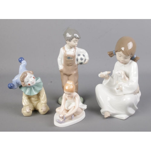 520 - Four ceramic figures. Includes three Nao (boy with football, girl feeding lamb and clown) and one Ro... 