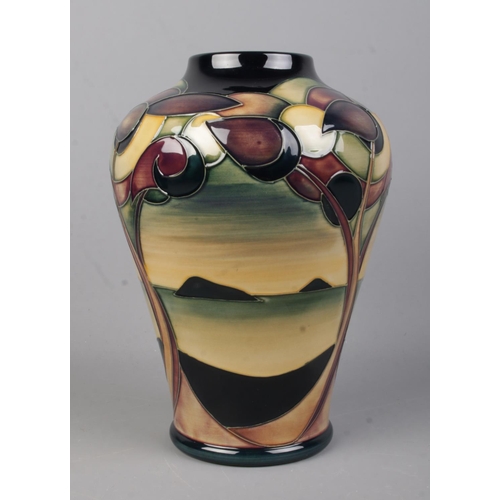 533 - A boxed Moorcroft vase, decorated in the Western Isles pattern. Bearing Seahorse stamp for designer ... 