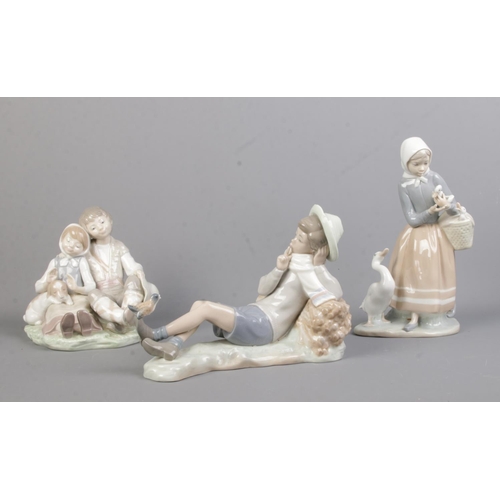 538 - Three Lladro ceramic figure groups, including 'Boy Bird Watcher' (4730), Shepherdess with Ducks and ... 