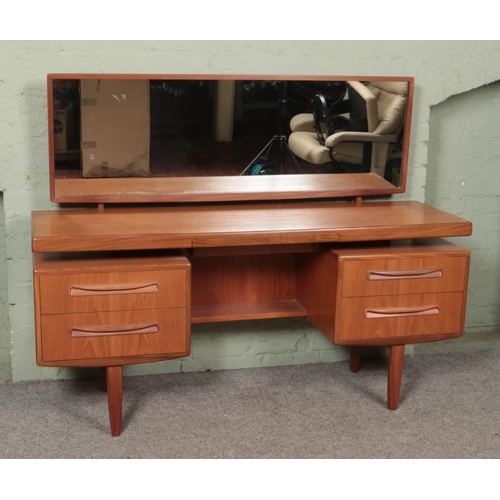 559 - A Victor Wilkins for G-Plan 'Fresco' dressing table, with floating near full length mirror. Height: ... 