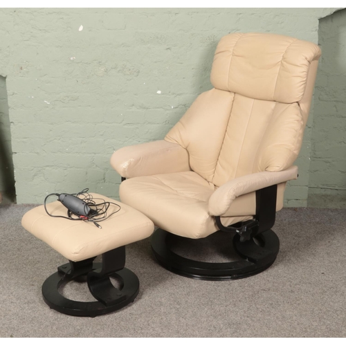 592 - A Homcom cream upholstered stressless massage chair with matching footstool.