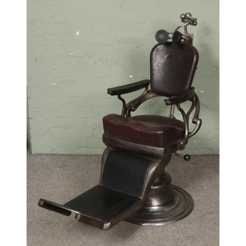 600 - An early to mid 20th century dentist chair. Bearing plaque for Sterling Dental Chair by The Amalgama... 